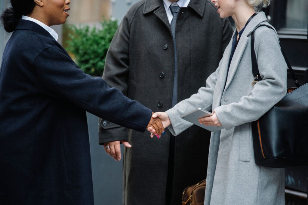 People shaking hands.