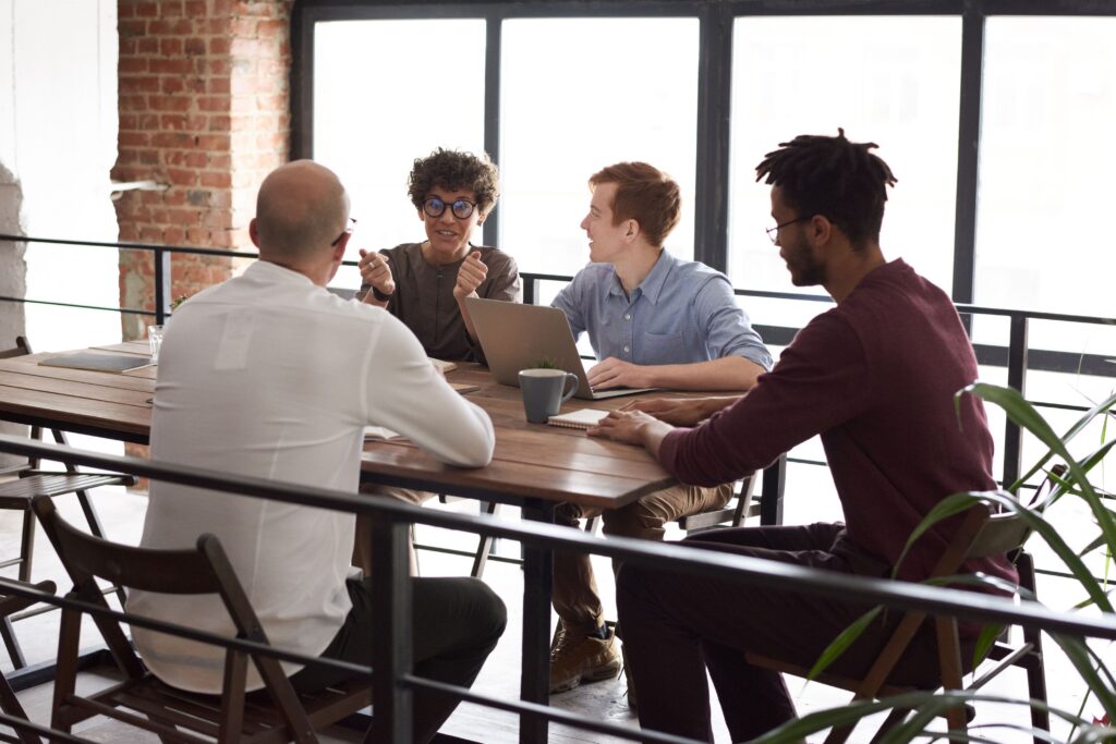 A group of colleagues sitting at a table.
